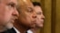 FILE - From left, U.S. National Counterterrorism Center Director Nicholas Rasmussen, Homeland Security Secretary Jeh Johnson and FBI Director James Comey testify before a House Homeland Security Committee hearing on Capitol Hill in Washington, July 14, 2016. 