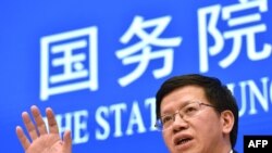 FILE - Wu Yanhua, vice chairman of the China National Space Administration, speaks at a press conference about China's Chang'e-4 moon probe in Beijing, Jan. 14, 2019.