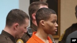 FILE - Lee Boyd Malvo listens to court proceedings during the trial of fellow sniper suspect John Allen Muhammad in Virginia Beach, Va. 