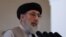 FILE - Afghan warlord Gulbuddin Hekmatyar speaks during a welcoming ceremony at the presidential palace in Kabul, Afghanistan, May 4, 2017. 