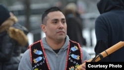 Ojibwe flutist Darren Thompson at the Indigenous Peoples March in Washington, D.C., Jan. 18, 2019. (Photo by Mike Garcia)