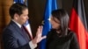 U.S. Secretary of State Marco Rubio and German Foreign Minister Annalena Baerbock speak during the Munich Security Conference in Munich on Feb. 15, 2025. The United States and Germany are among G7 members who agreed to keep working for a strong peace deal for Ukraine.