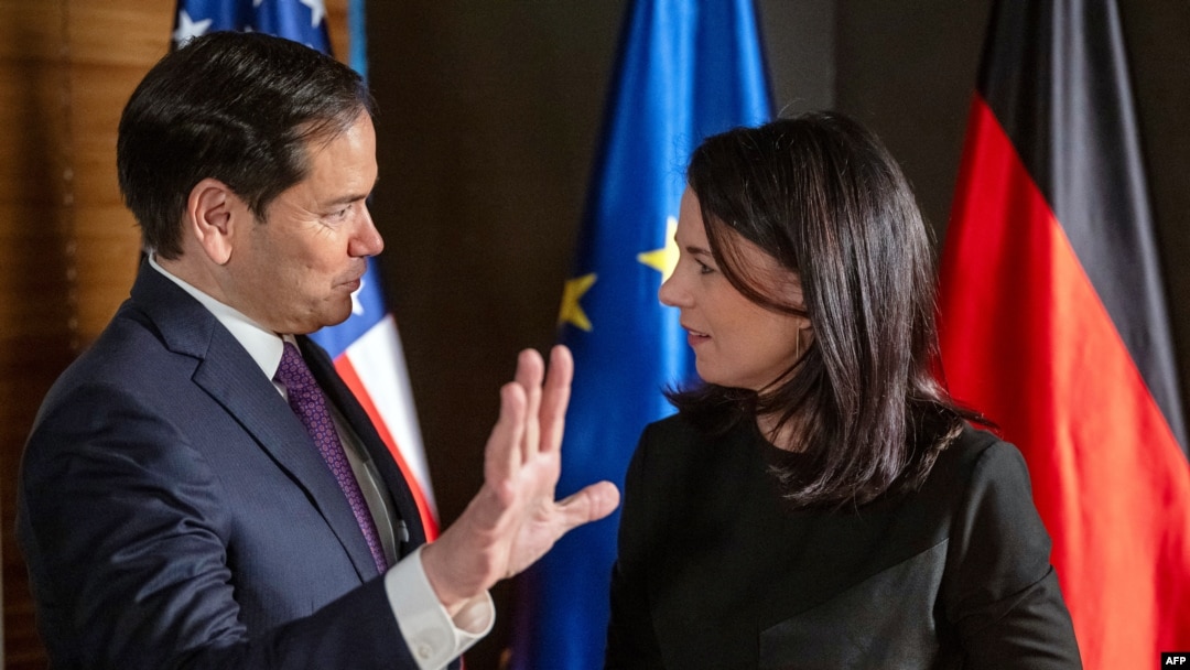 U.S. Secretary of State Marco Rubio and German Foreign Minister Annalena Baerbock speak during the Munich Security Conference in Munich on Feb. 15, 2025. The United States and Germany are among G7 members who agreed to keep working for a strong peace deal for Ukraine.