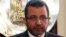 Egyptian Prime Minister Hisham Kandil speaks during a news conference in Cairo, December 30, 2012.