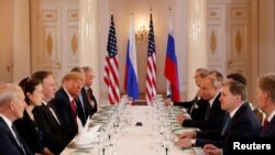 Presiden AS Donald Trump dalam pertemuan bilateral dengan Presiden Rusia Vladimir Putin di Helsinki, Finlandia, 16 Juli 2018. 