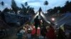 Villagers gather at a temporary shelter after fleeing their damaged village affected by Sunday's earthquake in North Lombok, Indonesia, Aug. 8, 2018. 