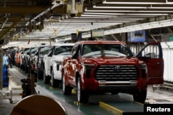 FILE - Tundra trucks and Sequoia SUV's exit the assembly line as finished products at Toyota's truck plant in San Antonio, Texas, U.S. April 17, 2023. (REUTERS/Jordan Vonderhaar/File Photo)