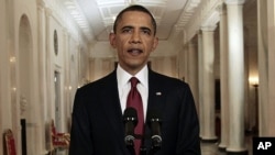 FILE - President Barack Obama reads a statement on the death of Osama bin Laden from the East Room of the White House in Washington, May 1, 2011. 