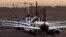 FILE - Airplanes are parked at the airport in Frankfurt, Germany, March 15, 2020.