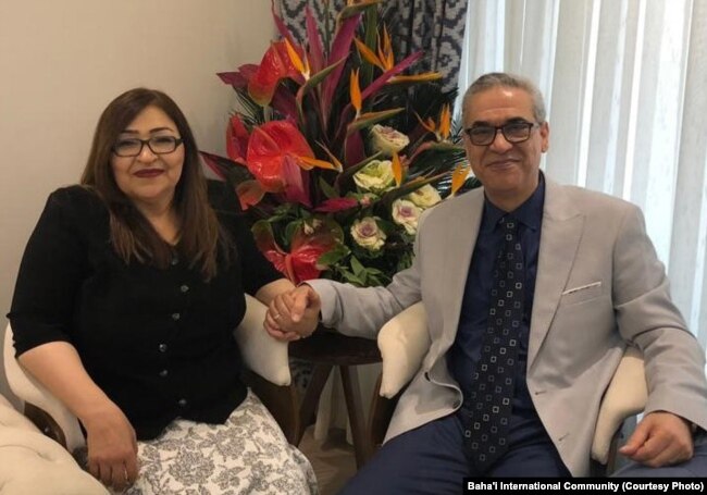 Former Iranian Baha'i community leader Afif Naeimi and his wife, Shohreh, celebrate his release from Tehran's Evin prison, Dec. 20, 2018.