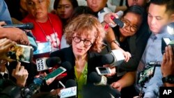 Agnes Callamard, U.N. special rapporteur on extrajudicial executions, talks to the media after her speech at a drug policy forum at University of the Philippines, May 5, 2017 in suburban Quezon city, northeast of Manila, Philippines. Callamard has rebuked Philippine President Rodrigo Duterte's deadly campaign against illegal drugs, saying world leaders have recognized it does not work. 