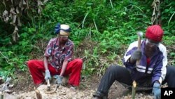 Villagers in Gundom, Cameroon, work on a US-paid sustainable clean water project