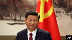 中共总书记习近平在北京人民大会堂举行的记者见面会上。(2017年10月25日)