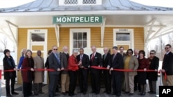 The 'White' and 'Colored' entrances are clearly marked at the reopening dedication ceremony of the Montpelier train depot.
