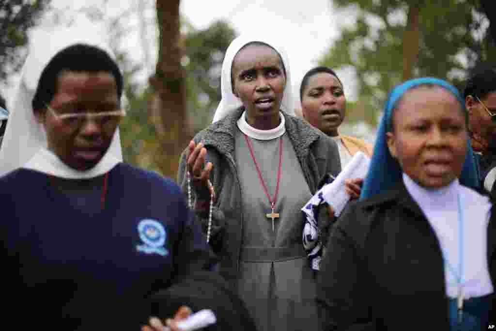 Catholic nuns pray near the Westgate Mall in Nairobi, Sept. 25, 2013. 