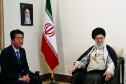 FILE - Iran's Supreme Leader Ayatollah Ali Khamenei meets with Japan's Prime Minister Shinzo Abe in Tehran, Iran, June 13, 2019.