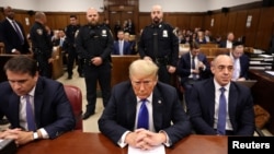 FILE - Former U.S. President Donald Trump waits at his trial in Manhattan Criminal Court on May 30, 2024, in New York. The state's Court of Appeals on June 18, 2024, declined to hear an appeal on a gag order placed on Trump during the trial.