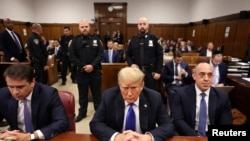 FILE - Former U.S. President Donald Trump arrives for his criminal trial at Manhattan Criminal Court in New York City, May 30, 2024. On Tuesday, a judge freed Trump to comment publicly about witnesses and jurors in the hush money criminal trial that led to his felony conviction.