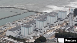 FILE - An aerial view shows Tokyo Electric Power Co.'s Fukushima Daini nuclear power plant in Naraha town, Fukushima prefecture, Japan, in this photo taken by Kyodo, Feb. 26, 2012. 