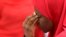 A woman takes part in a protest for the release of the abducted secondary school girls in the remote village of Chibok, during a sit-in protest at the Unity fountain Abuja, May 12, 2014. The leader of the Nigerian Islamist rebel group Boko Haram has offe