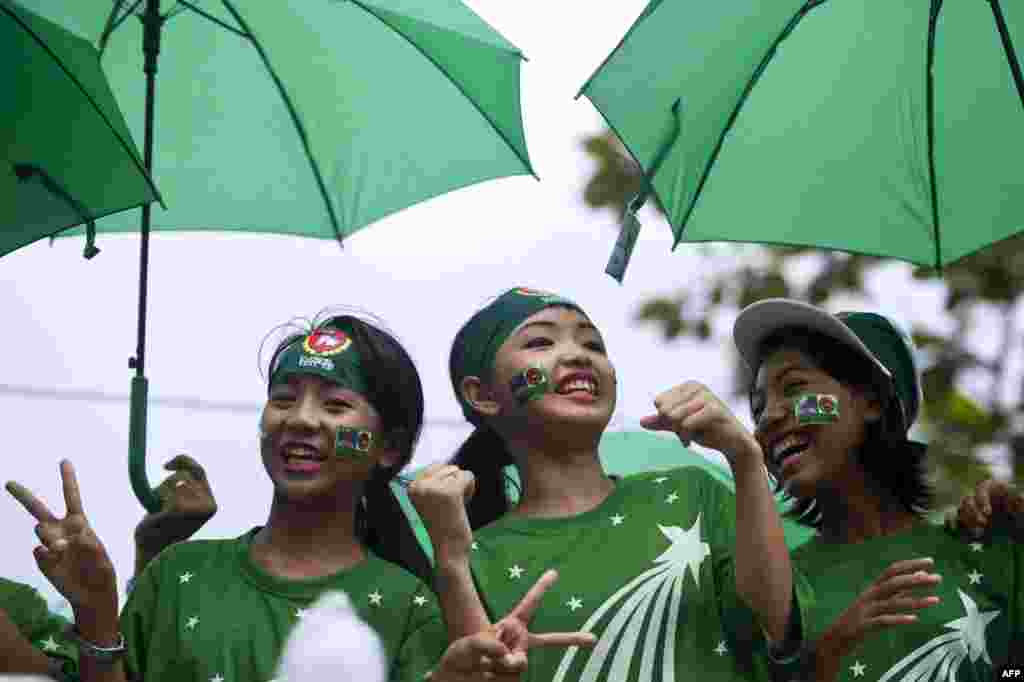 Singers perform during a campaign rally by supporters of the army-backed ruling Union Solidarity and Development Party (USDP) in Yangon, Myanmar (also known as Burma.) The once junta-run nation heads to the polls on Nov. 8 in what voters and observers hope will be the freest election in decades.