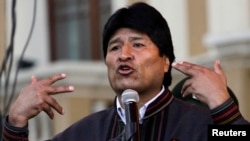 Bolivia's President Evo Morales speaks during May Day celebrations at Murillo square in La Paz, May 1, 2013.