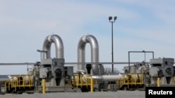 FILE - A TransCanada pipeline pump station operates outside Steele City, Nebraska, March 10, 2014.