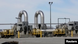 FILE - A TransCanada pipeline pump station operates outside Steele City, Nebraska, March 10, 2014.