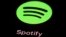 FILE: FILE- The Spotify app on an iPad. The music streaming service says it's cutting 6% of its workforce, becoming yet another tech company resorting to layoffs as the economic outlook worsens. CEO Daniel Ek announced the restructuring on Monday, Jan. 23, 2023. 