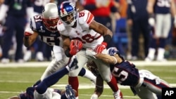 Giants offense leads New York to Super Bowl win over New England Patriots.