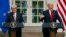 President Donald Trump and European Commission president Jean-Claude Juncker speak in the Rose Garden of the White House, Wednesday, July 25, 2018, in Washington. 