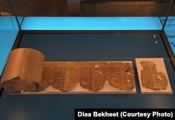 A fragment of the Dead Sea Scrolls is on display at the Museum of the Bible in Washington, D.C., Oct. 24, 2018. (Photo by Diaa Bekheet). The museum announced on Oct. 22, 2018, that five fragments of the ancient manuscripts known as the Dead Sea Scrolls are fake.