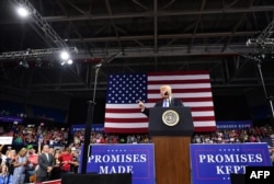 US President Donald Trump speaks during a political rally at Charleston Civic Center in Charleston, West Virginia