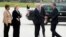 U.S. Rep.Brenda Lawrence, U.S. Sen. Debbie Stabenow, and Gov. Rick Snyder greet President Obama as he arrives at the Bishop International Airport in Air Force One for a visit to Northwestern High School in Flint, Mich., May 4, 2016. 