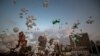 People release scores of white balloons bearing the names of the Aug. 4 deadly explosion during the two-month anniversary, next to the seaport of Beirut, Lebanon, Oct. 4, 2020.