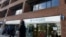 Pedestrians pass a branch of Barclays Bank in Swiss Cottage in London, Sept. 20, 2013.
