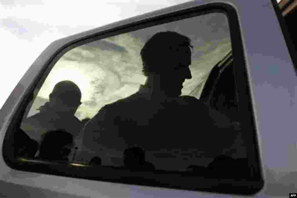 Republican presidential candidate, former Pennsylvania Sen. Rick Santorum leaves after a campaign stop at the Cook Out restaurant, Friday, Jan. 13, 2012, in Gaffney, S.C. (AP Photo/Matt Rourke)