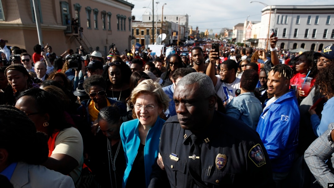 Democratic presidential candidate Sen. Elizabeth Warren prepares to walk across the Edmund Pettus Bridge in Selma, Ala., March 1, 2020, to commemorate the 55th anniversary of "Bloody Sunday," when white police attacked black marchers in Selma. 
