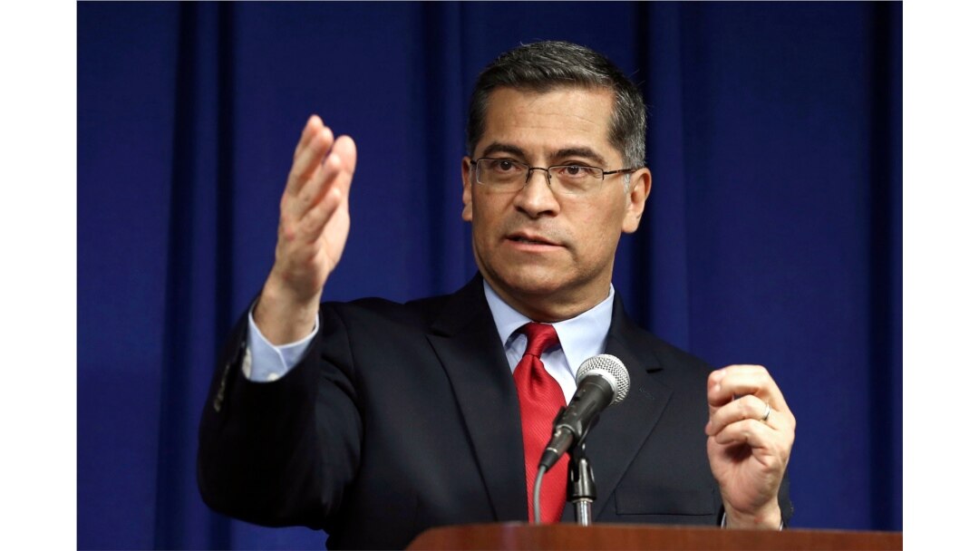 FILE - California Attorney General Xavier Becerra speaks during a news conference in Sacramento, California, March 5, 2019.