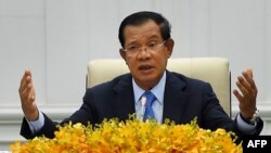 Cambodia's Prime Minister Hun Sen speaks to the media during a press conference at the Peace Palace in Phnom Penh on February 24, 2020. (Photo by TANG CHHIN Sothy / AFP)