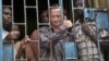 David Cecil, British producer of a play concerning the condition of Uganda's gays, in a courtroom cell, Kampala, Sept. 13, 2012.