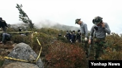 지난 2012년 9월 한국 국방부 유해발굴 감식단과 육군 지원 병력이 설안삭에서 유해 발굴 작업 중이다. (자료사진)