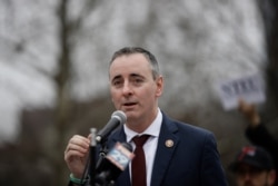 FILE - Congressman Brian Fitzpatrick, R-Pa., speaks during a demonstration against the partial government shutdown on Independence Mall in Philadelphia, Jan. 8, 2019.