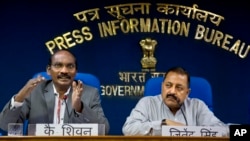 Indian Space Research Organization (ISRO) Chairman K. Sivan, left, and Junior Indian Minister for Department of Atomic Energy and Space Jitendra Singh address a news conference in New Delhi, India, Aug. 28, 2018. 