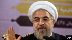 Tổng thống Iran Hassan Rouhani phát biểu trong một cuộc họp báo ở Tehran, Iran, ngày 14 tháng 6, 2014.
