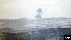 This picture taken from a position in northern Israel bordering Lebanon shows smoke billowing during Israeli bombardment of a southern Lebanese area, Sept. 4, 2024. 