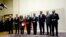 EU foreign policy chief Catherine Ashton, third from left, delivers statement during ceremony marking deal between Iran, six world powers, United Nations, Geneva, Nov. 23, 2013.
