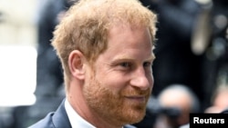 FILE - Britain's Prince Harry, Duke of Sussex walks outside the Rolls Building of the High Court in London, Britain June 6, 2023. 