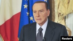 Former Italian Prime Minister Silvio Berlusconi speaks during his video message recording where he confirmed that he would not lead his centre-right People of Freedom (PDL) party in next year's election in Rome, October 25, 2012.