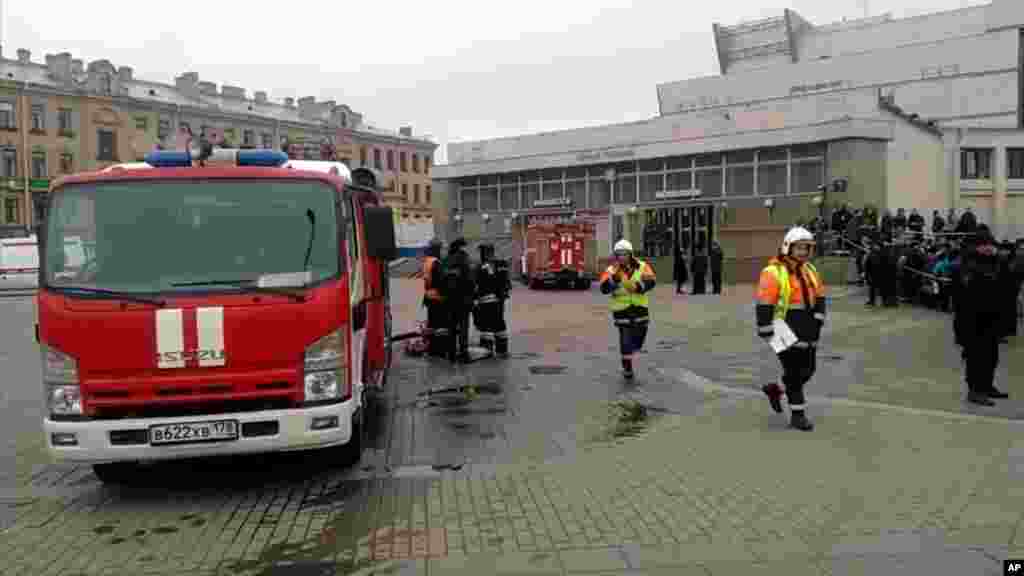 In this image taken from video footage, emergency services work outside Sennaya Square metro station in St Petersburg, Russia, April 3, 2017.